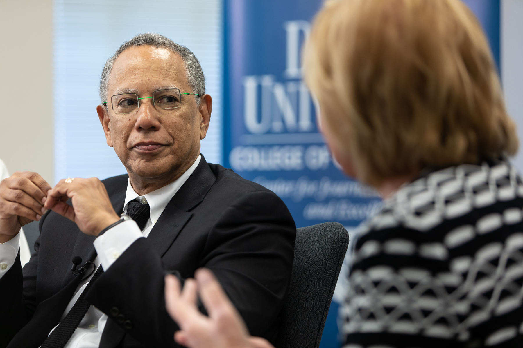 Dean Baquet, executive editor of the The New York Times, talks with Carol Marin, co-director of the Center for Journalism Integrity and Excellence, and College of Communication journalism students on Thursday, April 25. (DePaul University/Jeff Carrion)